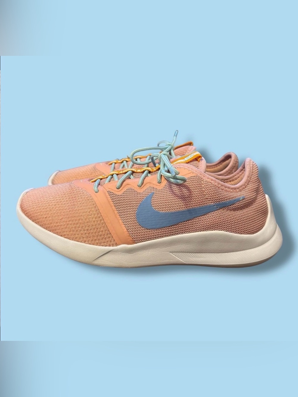 Women’s pink Nike running shoes size 6.5